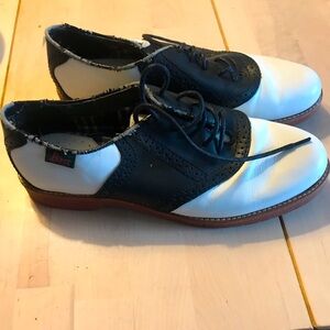 Black and white Bass saddle shoes